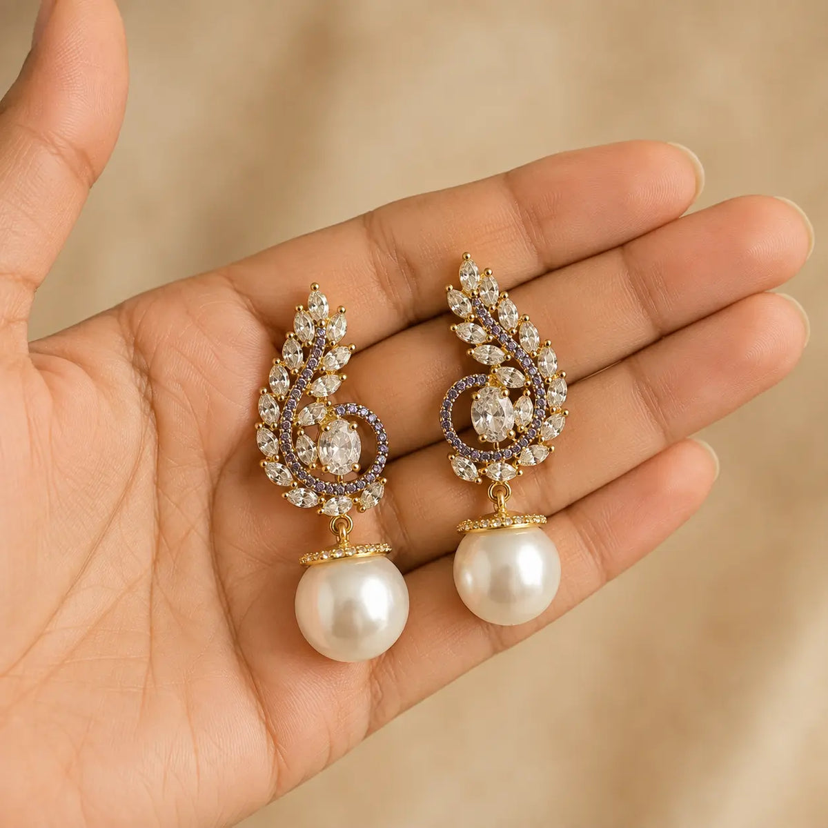 Meher Purple paisley pearl earrings handheld view