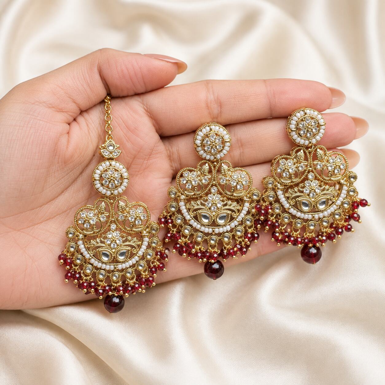 Zeenat Red Gold Filigree Chandbali Earrings and Teeka Set hand-held view
