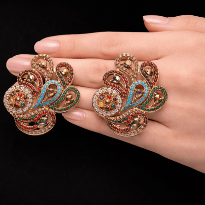 Amber Aura Paisley Earrings – Gold Pavé Statement Studs with CZ Clusters - Riwaaj