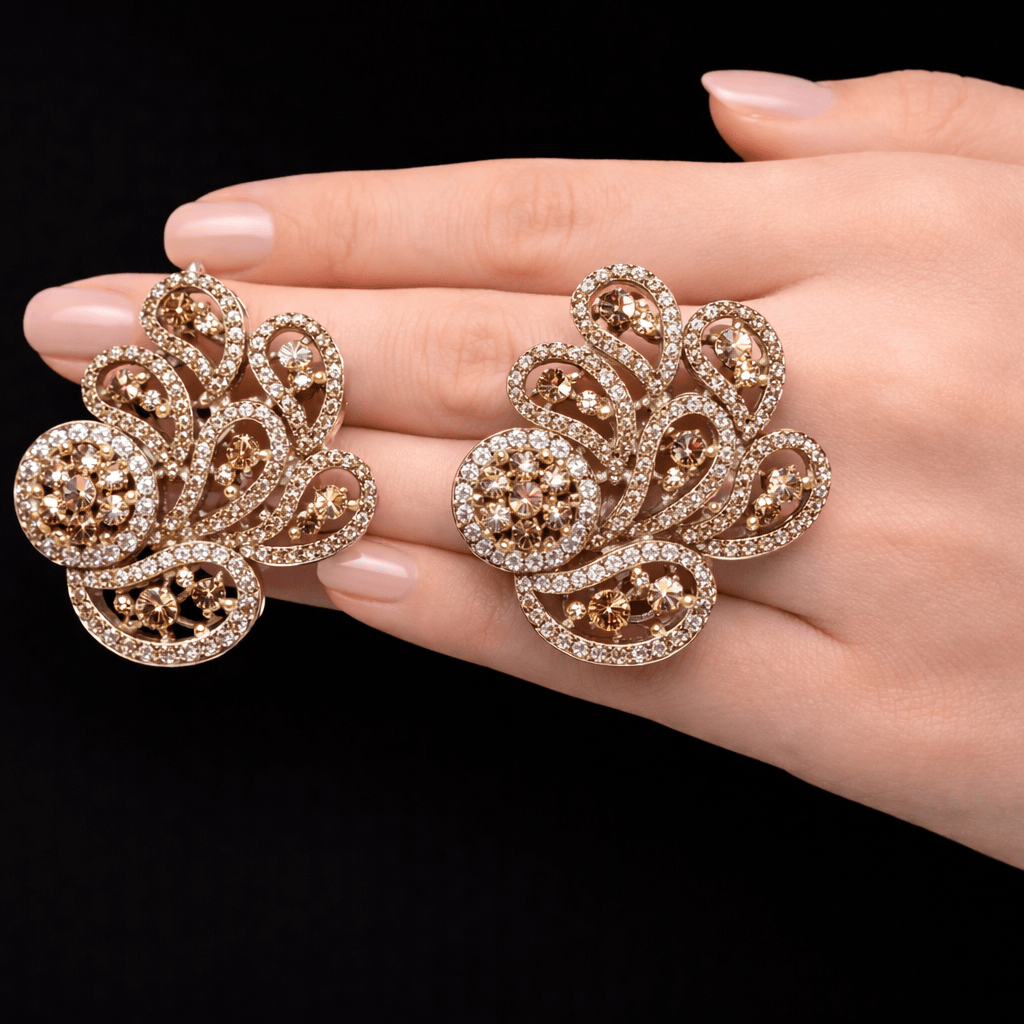 Amber Aura Paisley Earrings – Gold Pavé Statement Studs with CZ Clusters - Riwaaj