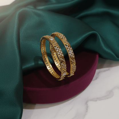 Naureen Shimmer Zirconia Bangles - 22K Gold Plated Diamond - Cut Bracelets - Riwaaj
