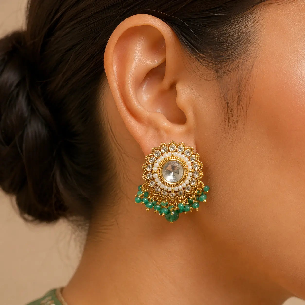 Noorani Green Kundan stud worn close-up