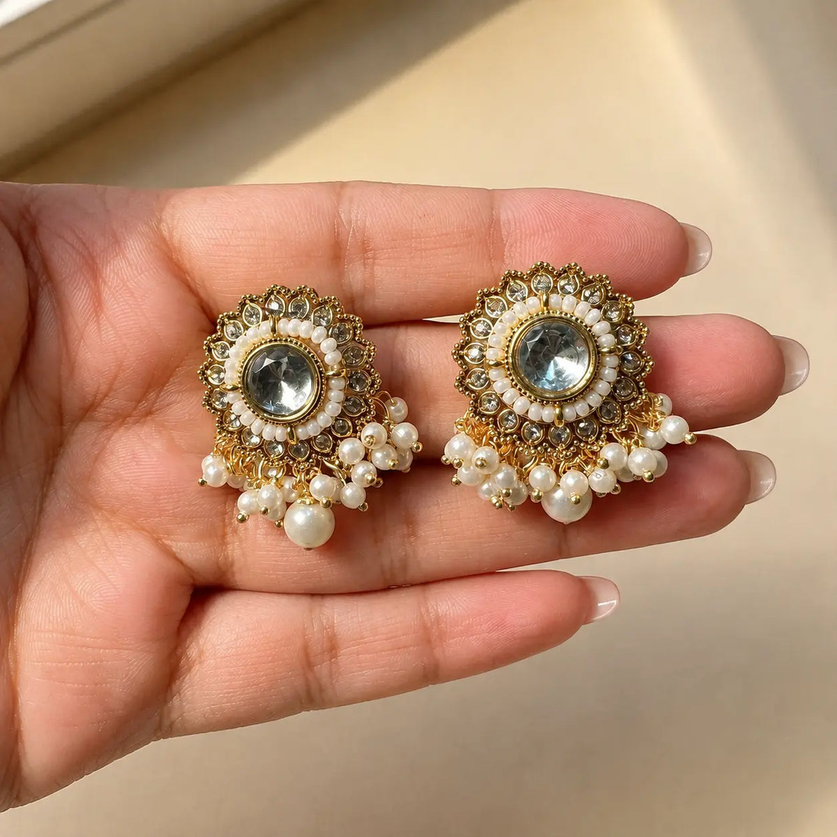 Noorani Pearl earrings handheld scale view