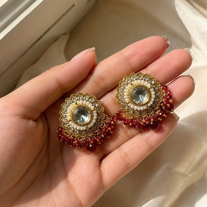 Noorani Red earrings handheld scale view