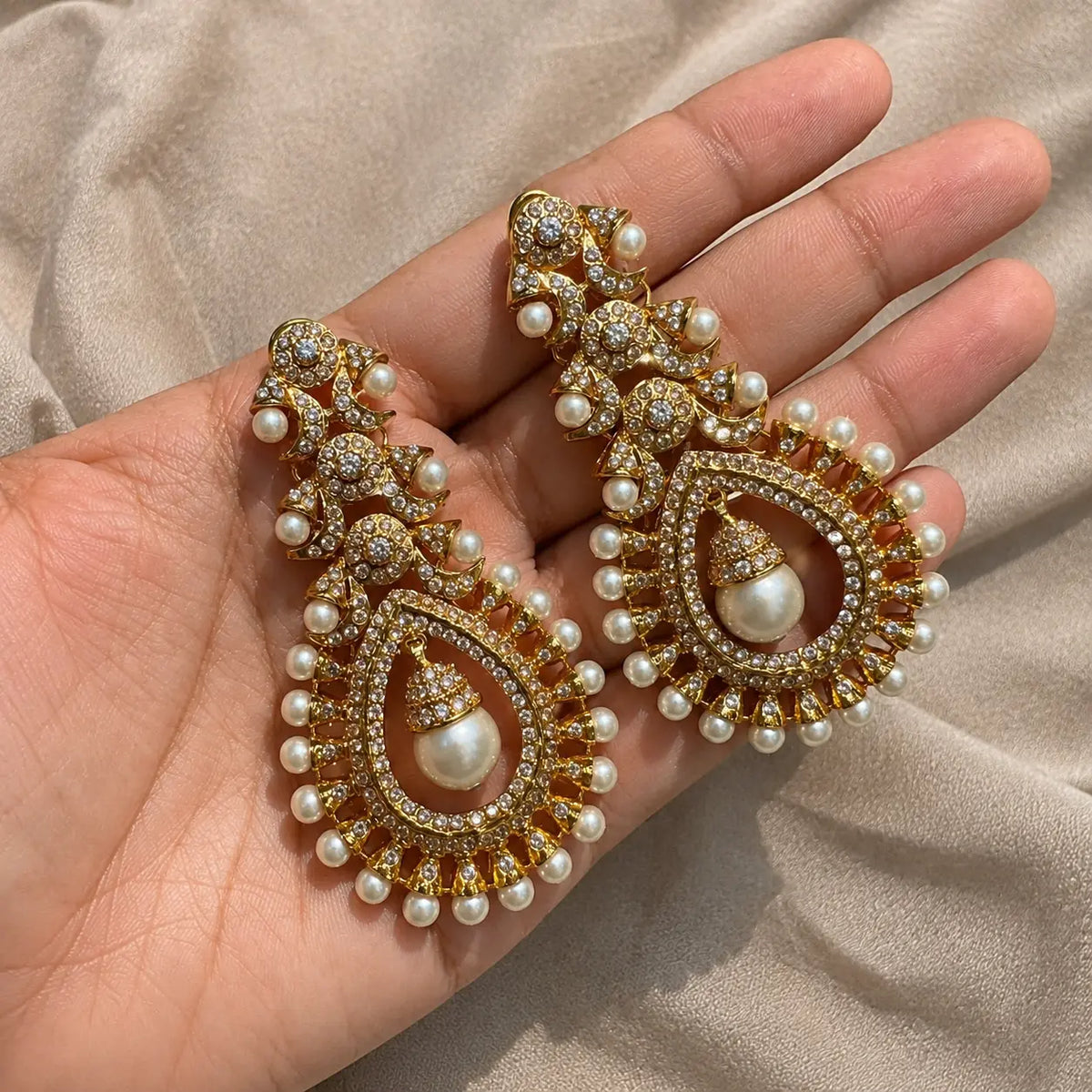 Mehrunisa Kundan Pearl Drop Statement Earrings - pearl handheld