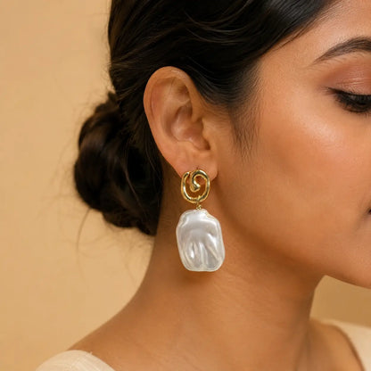 Sadaf baroque pearl earrings worn by model