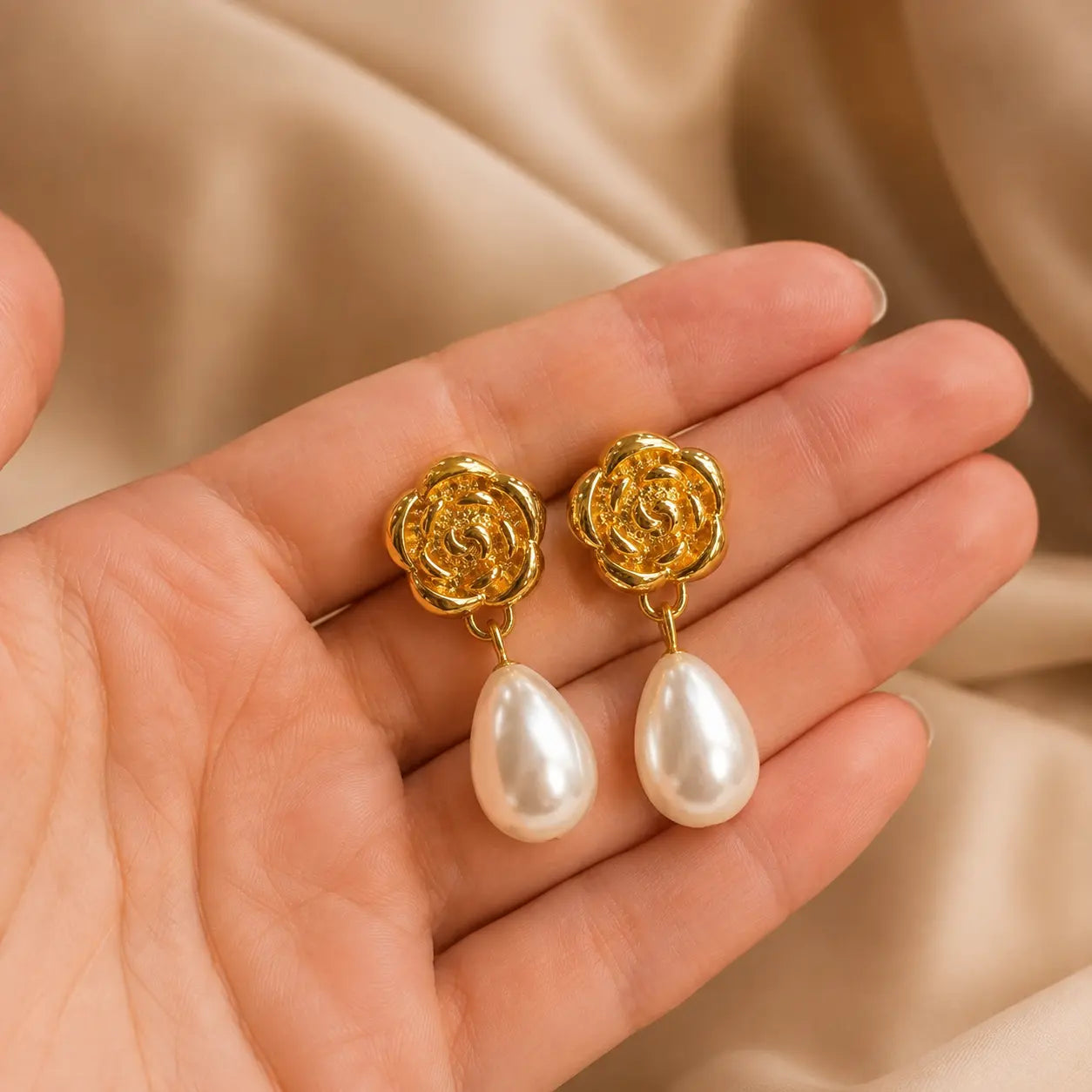 Gulab earrings handheld view