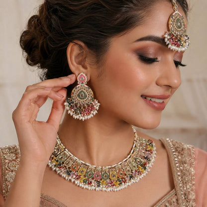Matching multicolour kundan bridal earring worn by model