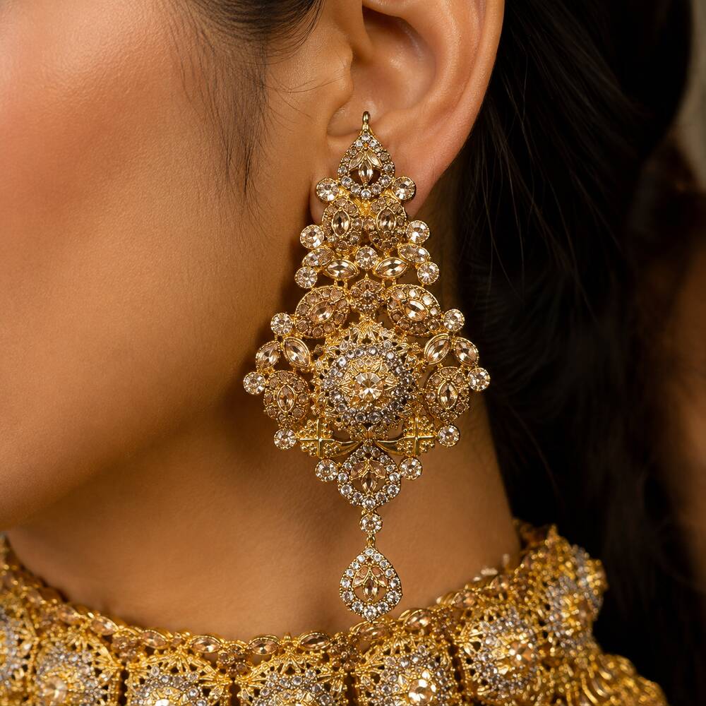 Shahkaar champagne kundan earring worn by model