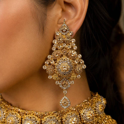 Shahkaar champagne kundan earring worn by model