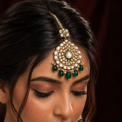 Dilkash Emerald Kundan bridal teeka close-up on model