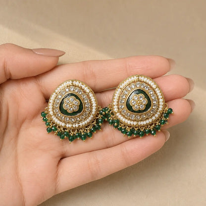 Afsana green earrings handheld scale view