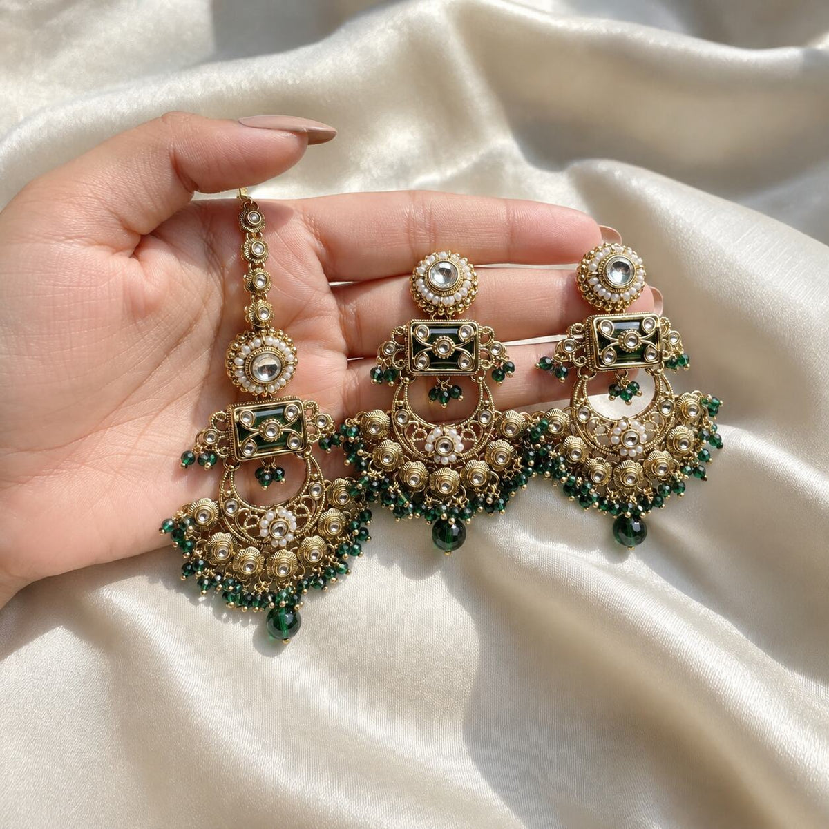 Haniya Green Gold Kundan Chandbali Earrings and Teeka Set hand-held view
