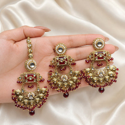 Haniya Red Gold Kundan Chandbali Earrings and Teeka Set hand-held view