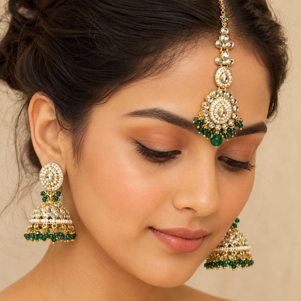 Mahira Green Kundan Jhumka Earrings and Teeka Set model view