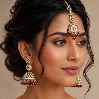 Mahira Ruby Kundan Jhumka Earrings and Teeka Set model view