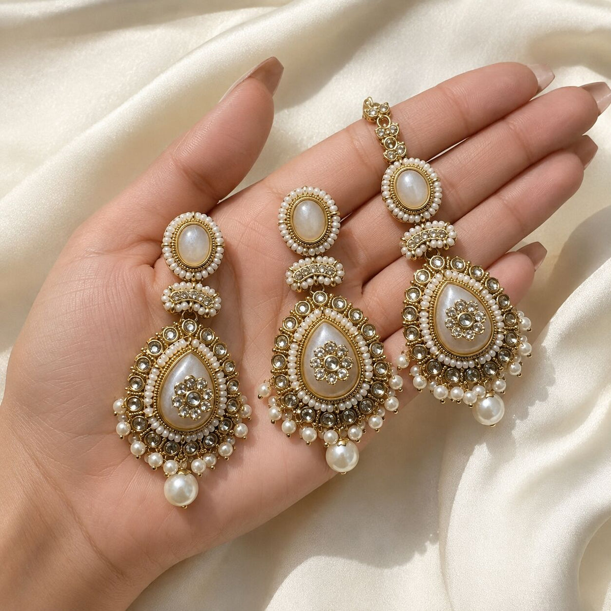 Roshni Pearl Kundan Jhumka Earrings and Teeka Set hand-held view