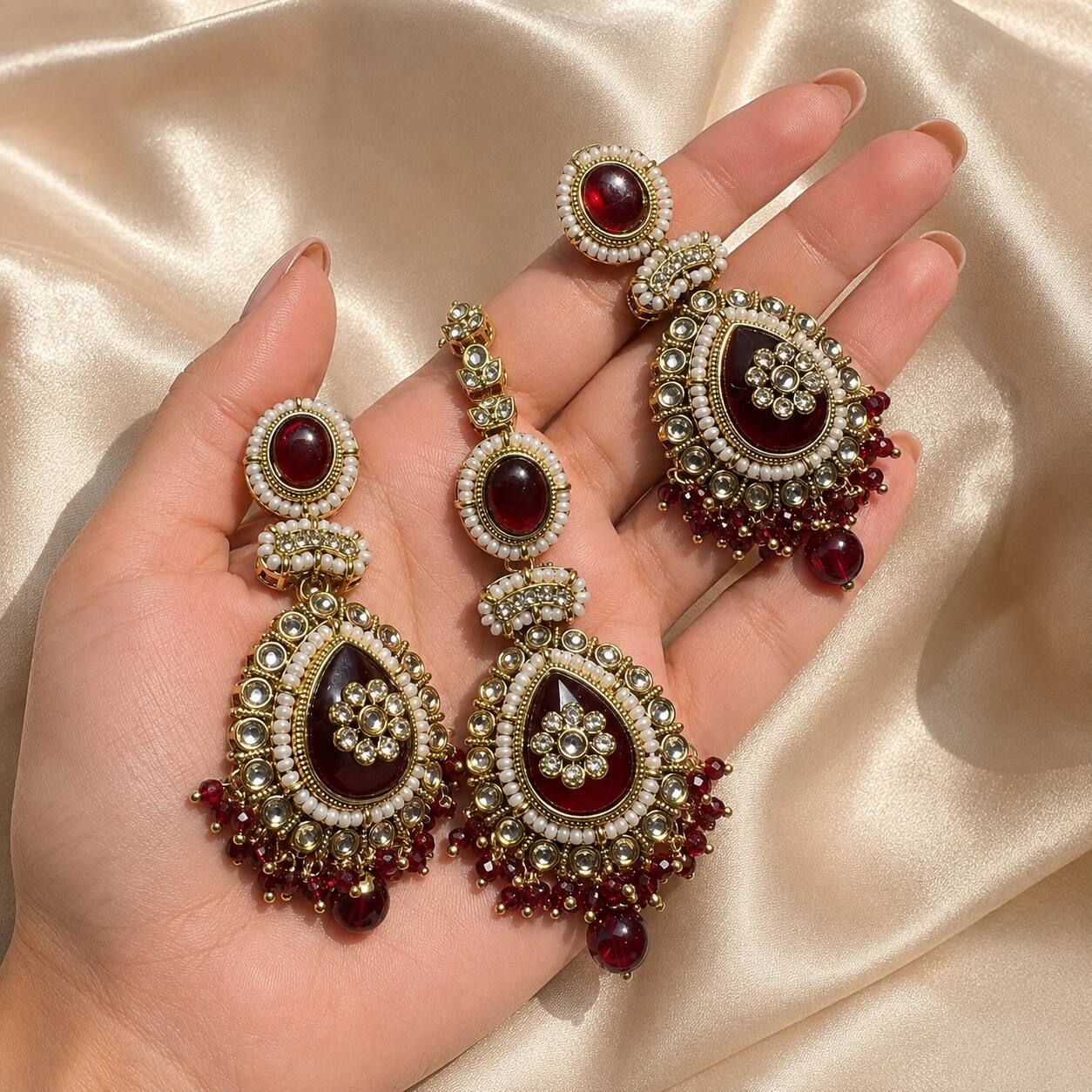 Roshni Red Kundan Jhumka Earrings and Teeka Set hand-held view